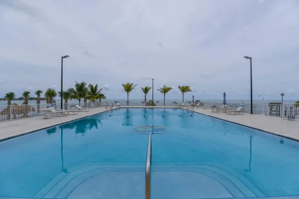 a kitchen with counter top and outdoor space
