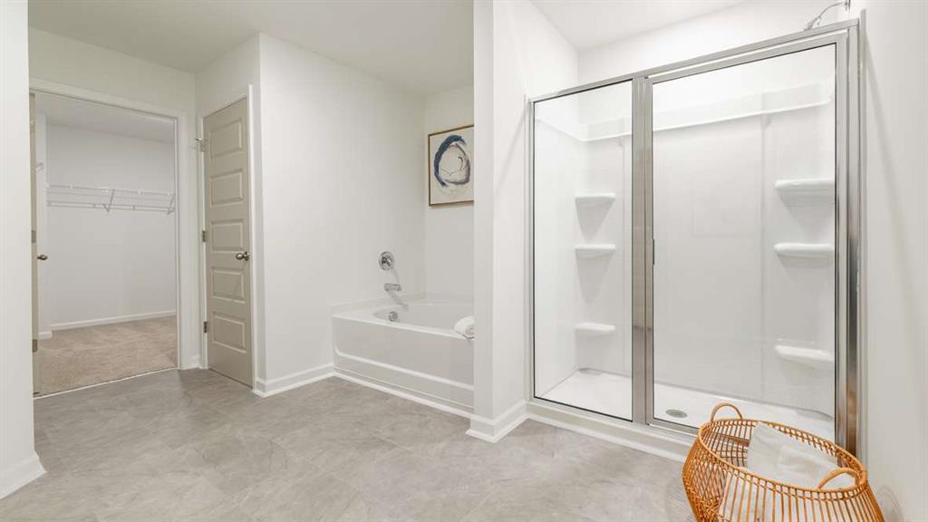 3562 Matthew Court Decatur, GA 30030 - Photo 20 of 30 a spacious bathroom with a tub shower and a mirror