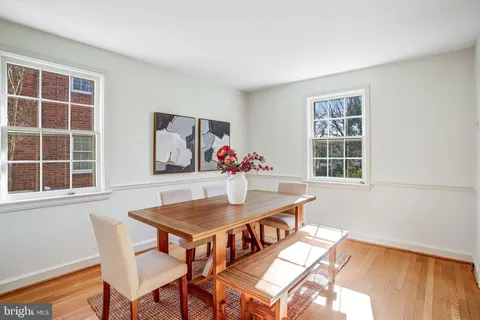 a room with furniture and air hockey table
