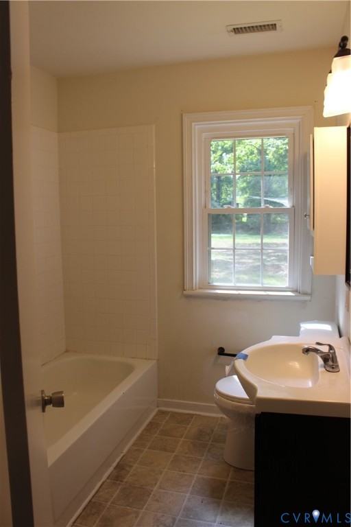 10035 Wycliff Road Chesterfield, VA 23236 - Photo 5 of 12 Bathroom featuring a single-pane window, white tub