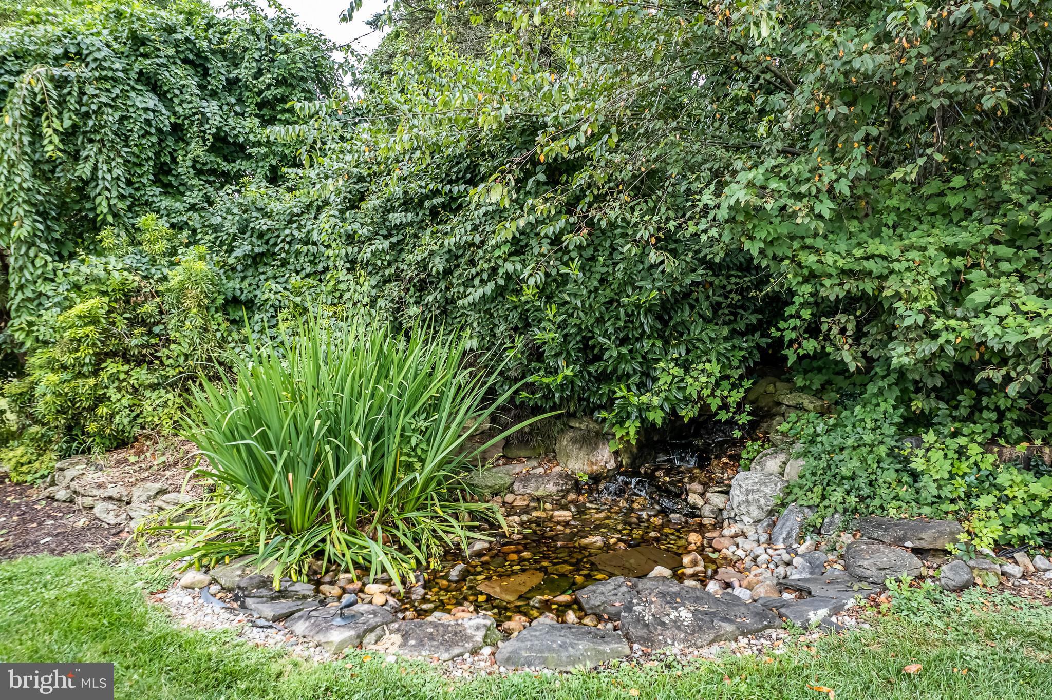 34 Somerset Road Huntingdon Valley, PA 19006 - Photo 8 of 42 Waterfall in backyard