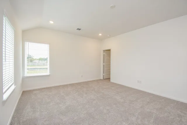 an empty room with windows