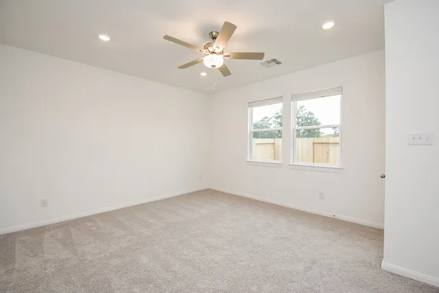 a bathroom with a double vanity sink and mirror