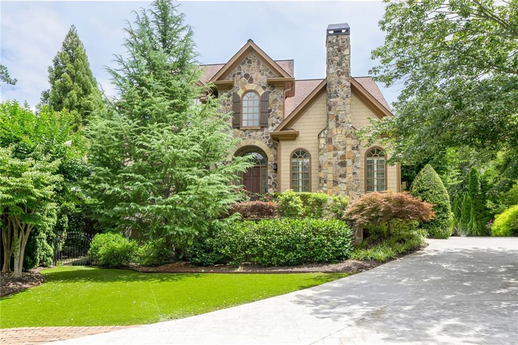 STUNNING 5 BED, 5.5 BATH TREASURE IN A QUIET, GATED COMMUNITY
