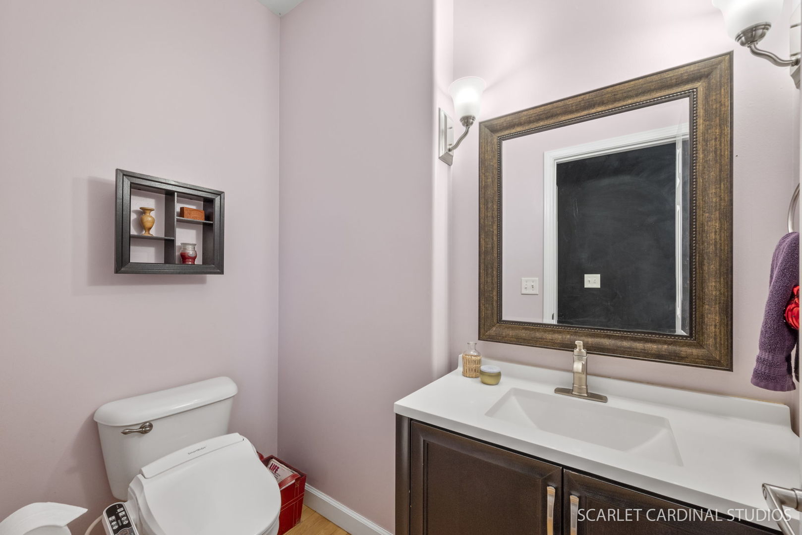 716 Cornwall Circle Sugar Grove, IL 60554 - Photo 11 of 29 a bathroom with a toilet sink and mirror