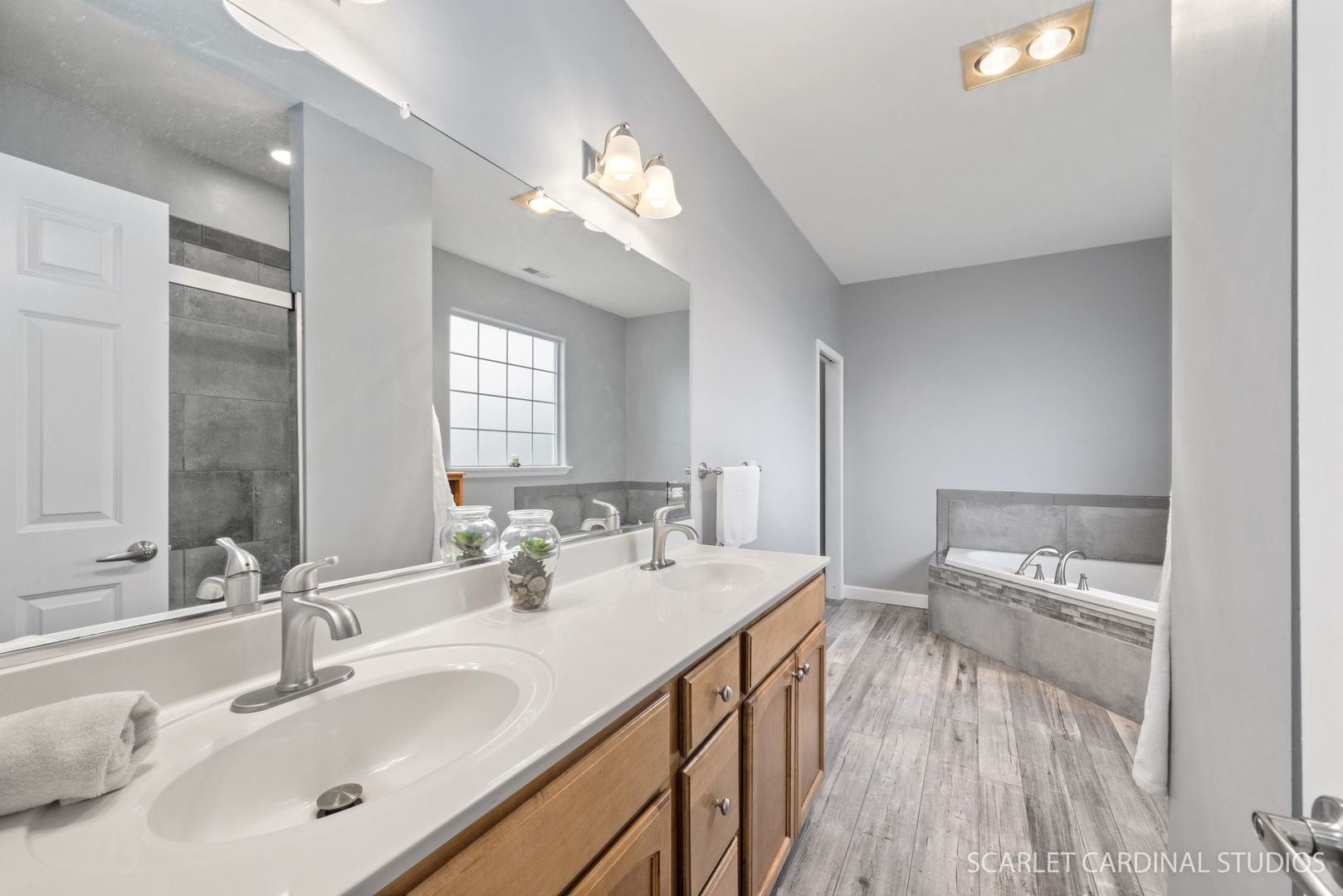 716 Cornwall Circle Sugar Grove, IL 60554 - Photo 13 of 29 a bathroom with a sink double vanity and a mirror