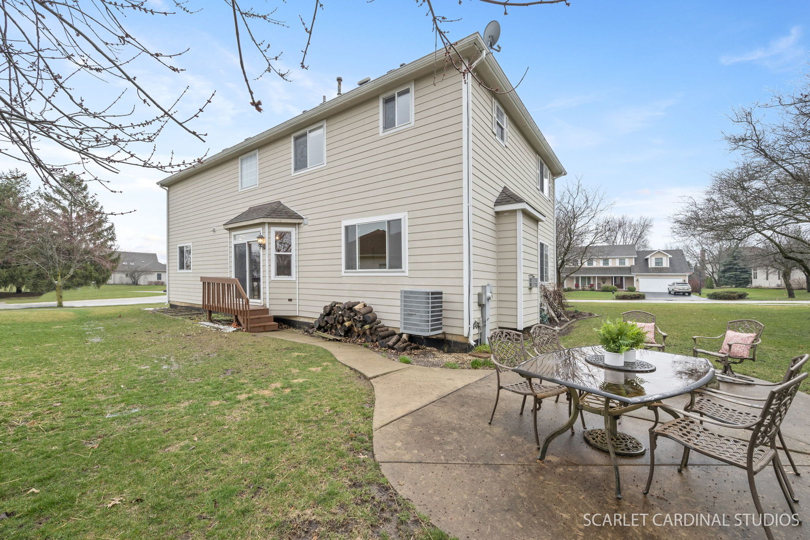 716 Cornwall Circle Sugar Grove, IL 60554 - Photo 26 of 29 a view of a house with backyard and sitting area