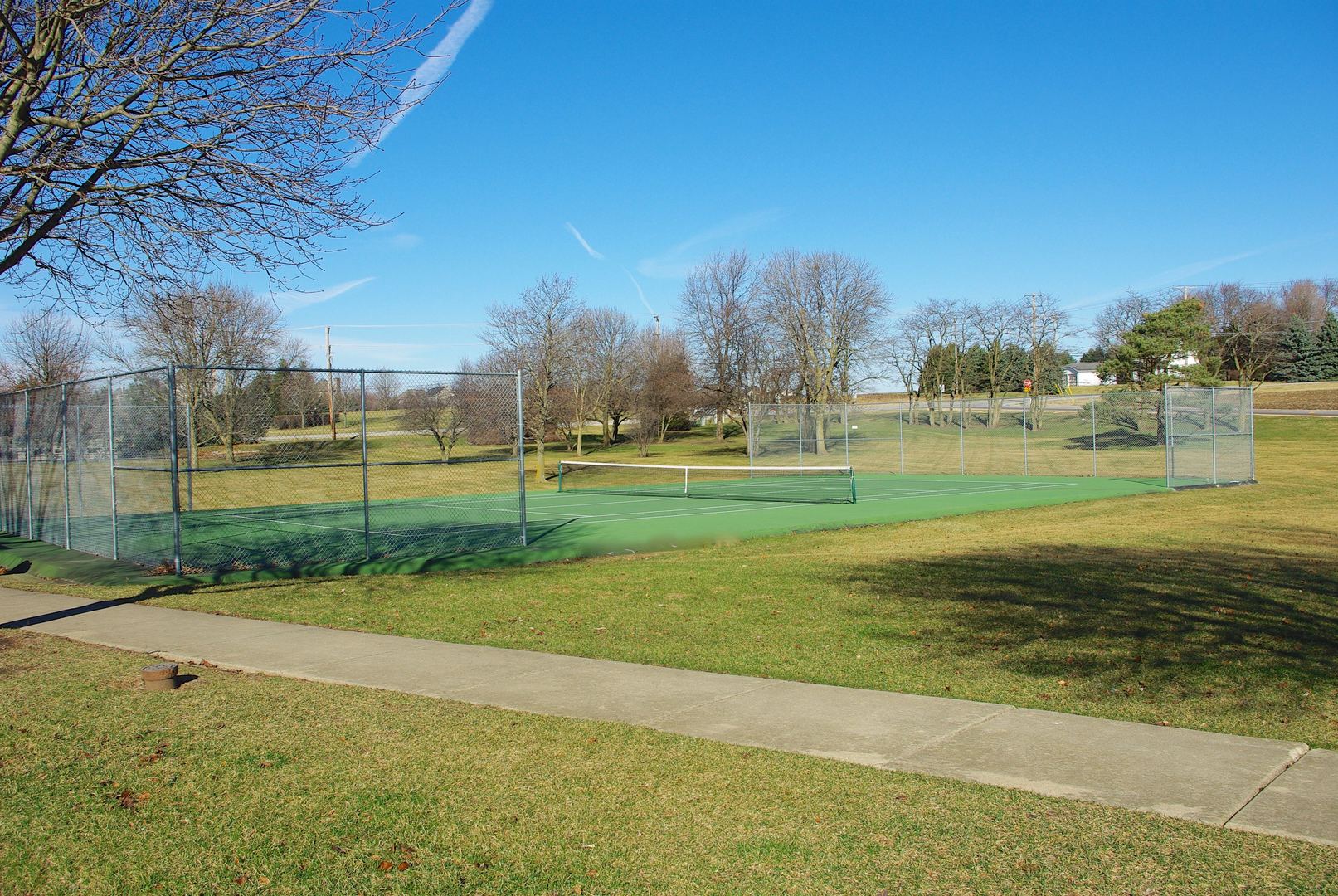 716 Cornwall Circle Sugar Grove, IL 60554 - Photo 28 of 29 a view of a golf course with a lake view