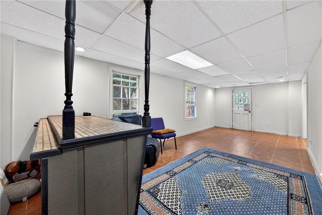 4673 Arrowhead Trail Southwest Lilburn, GA 30047 - Photo 22 of 28 a view of a living room and bathroom