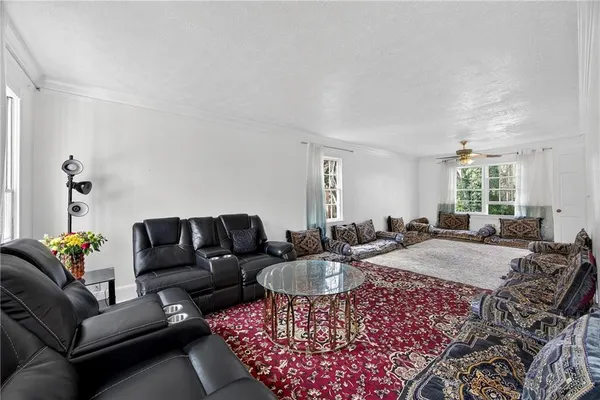 a living room with furniture and a couch