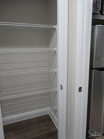 a view of small space with racks on the wall