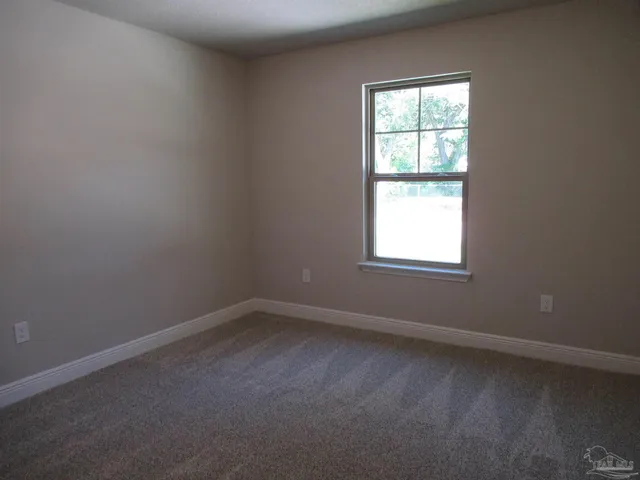 an empty room with closet