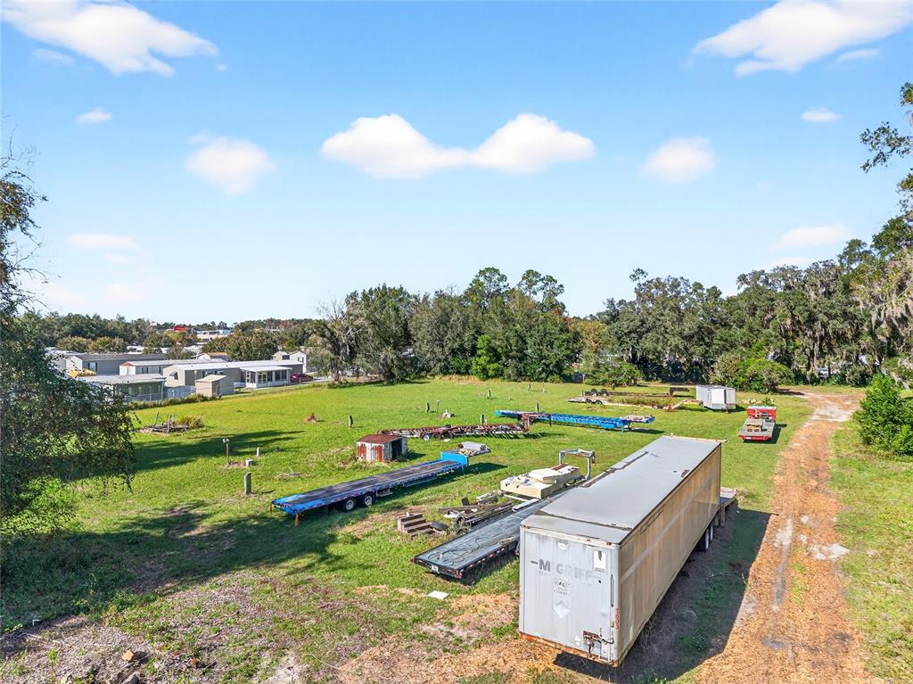 10389 Southeast 50th Avenue Belleview, FL 34420 - Photo 4 of 10 a view of a lake with a houses
