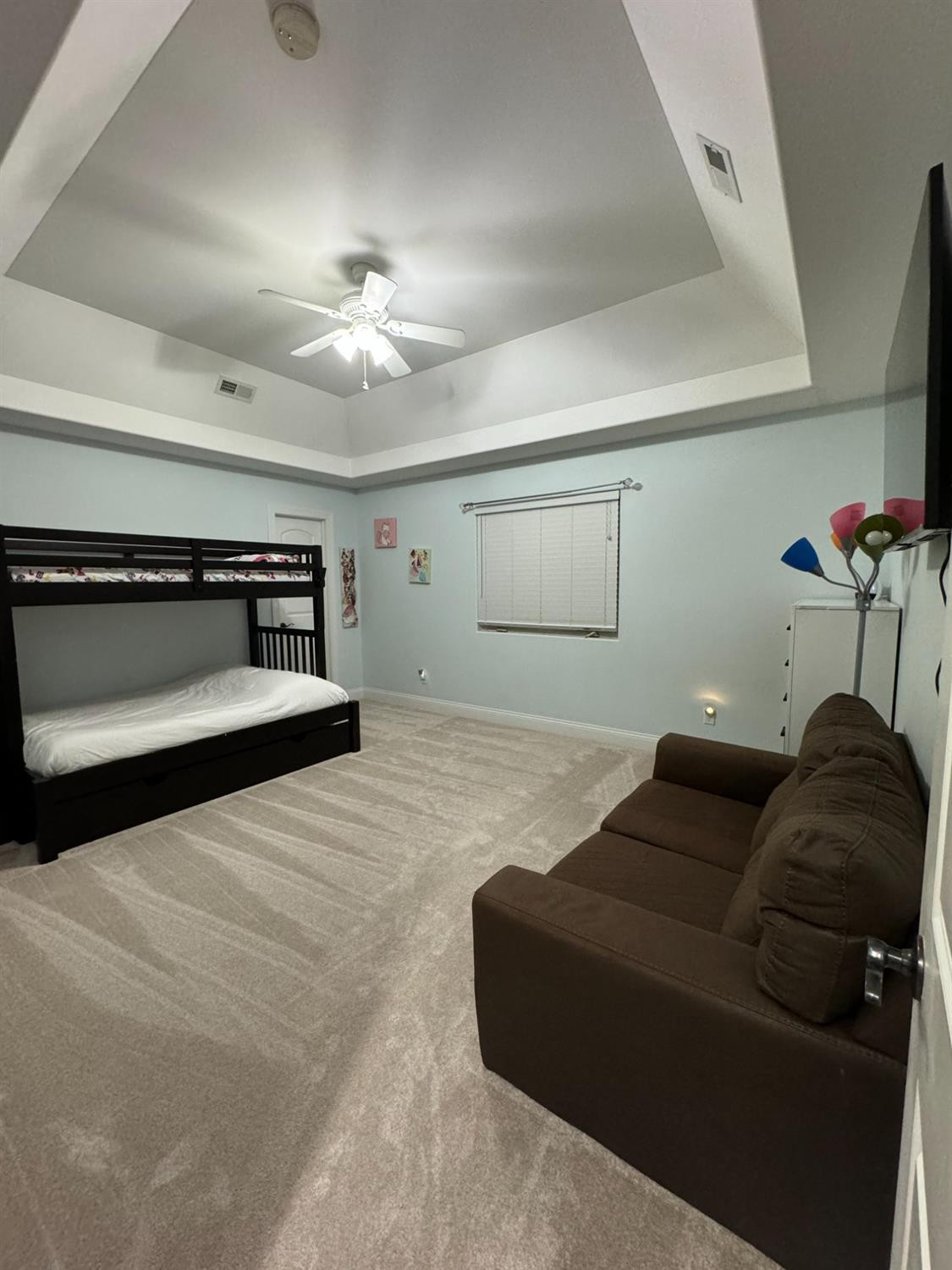 9310 Doubletree Drive North Crown Point, IN 46307 - Photo 12 of 20 a bedroom with a bed and a ceiling fan