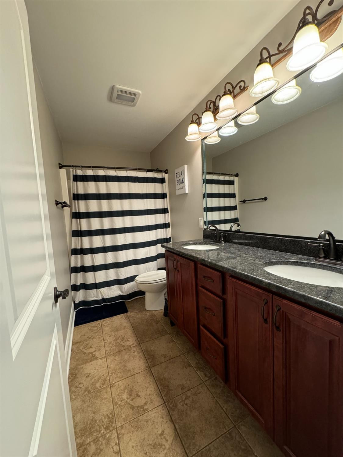 9310 Doubletree Drive North Crown Point, IN 46307 - Photo 20 of 20 a bathroom with a sink and a mirror