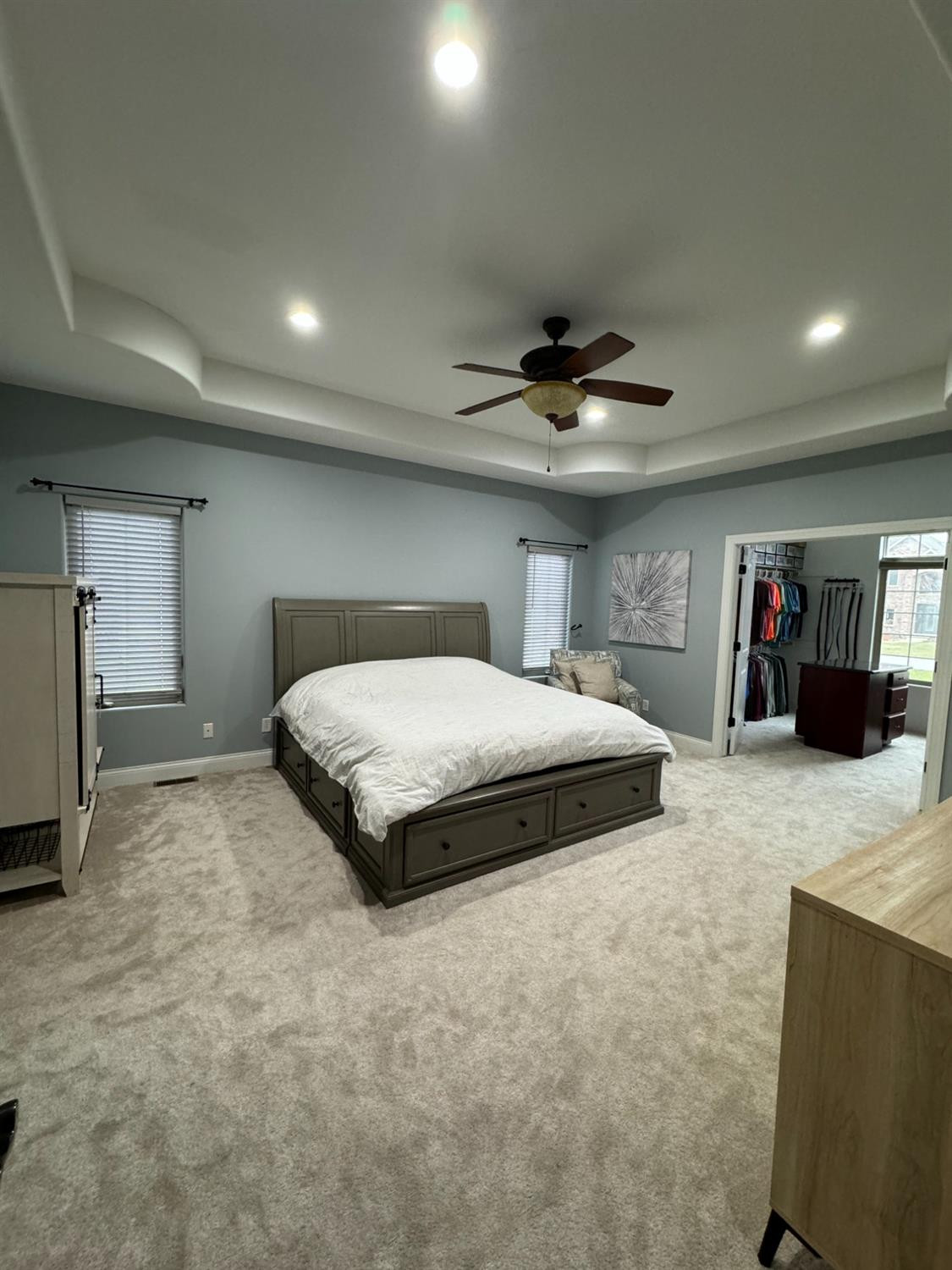 9310 Doubletree Drive North Crown Point, IN 46307 - Photo 8 of 20 a bedroom with a bed and a walk in closet
