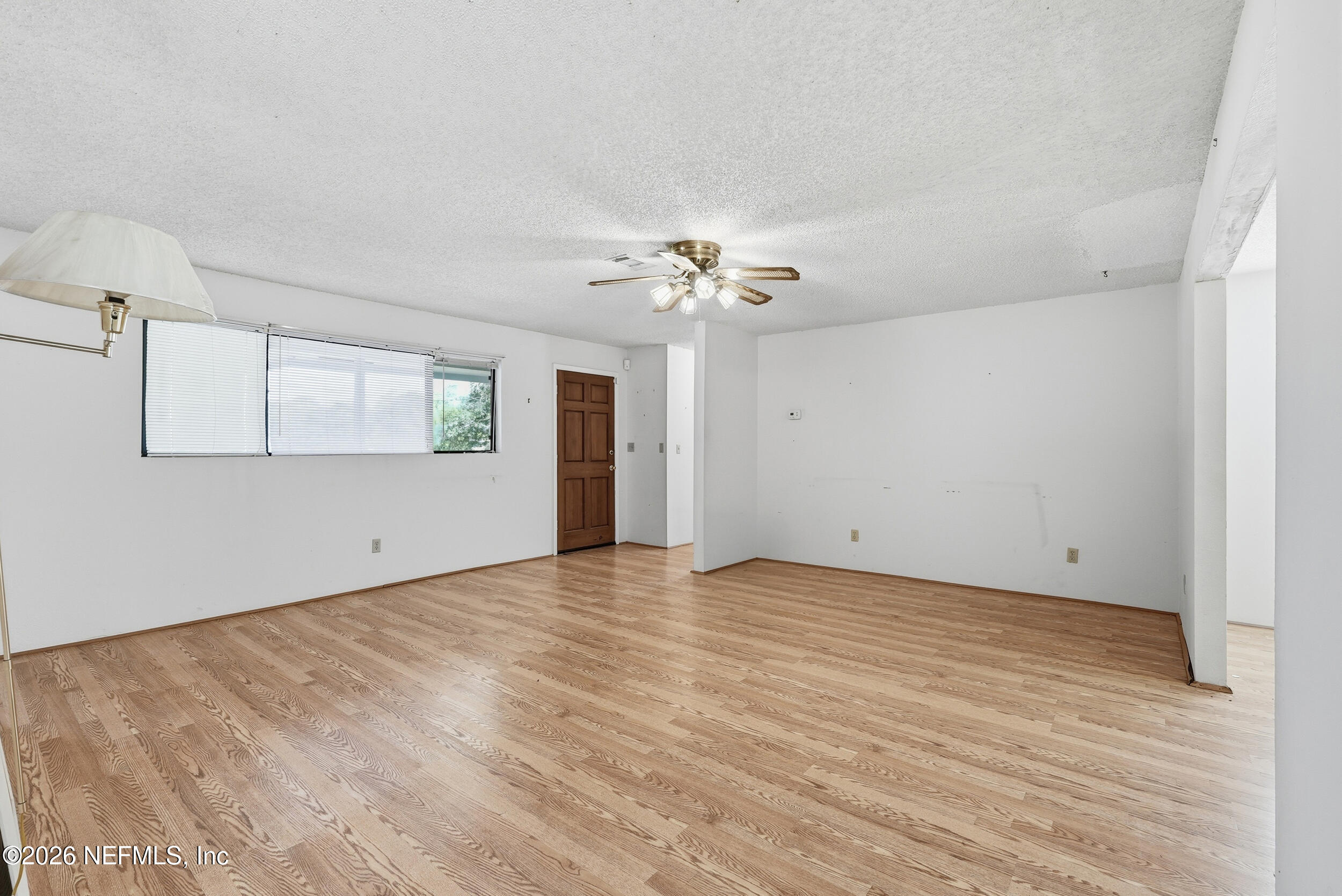 7593 Silver Sands Road Keystone Heights, FL 32656 - Photo 6 of 36 a view of an empty room with a window