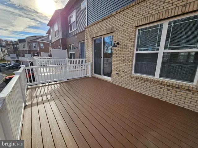 a view of a brick house with wooden floor