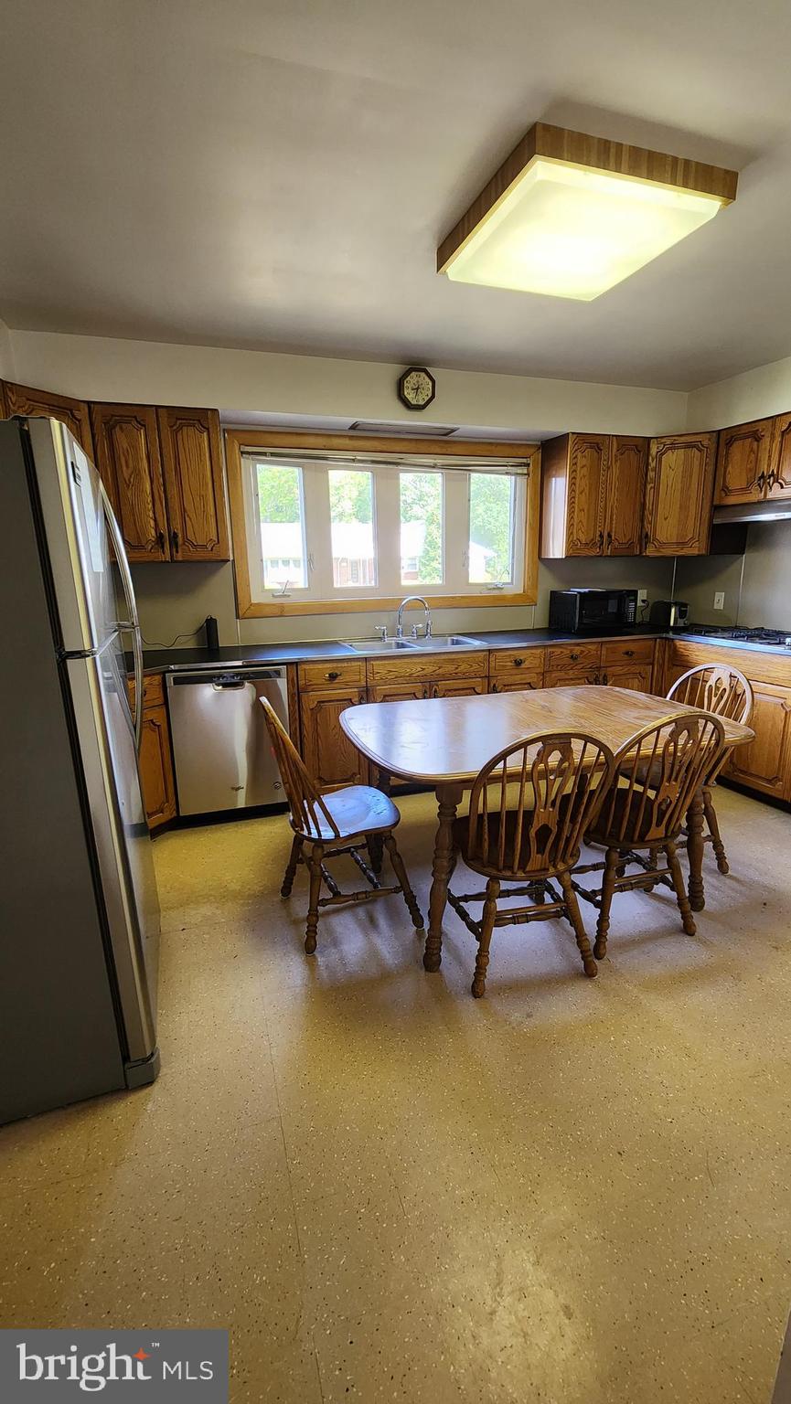 202 Holly Street Glassboro, NJ 08028 - Photo 5 of 23 a living room with furniture and a pool table