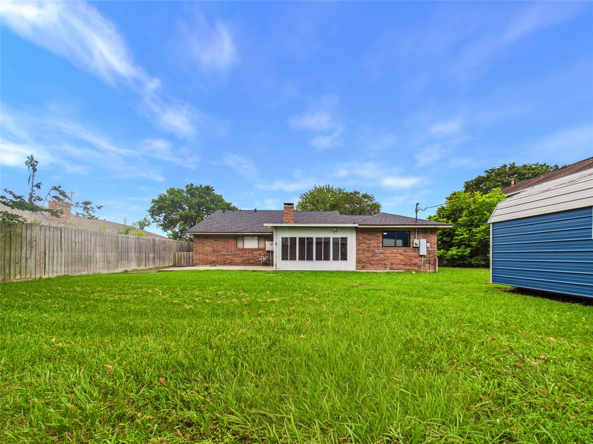10306 Rustic Rock Road La Porte, TX 77571 - Photo 34 of 38 a view of a house with a big yard plants and large trees