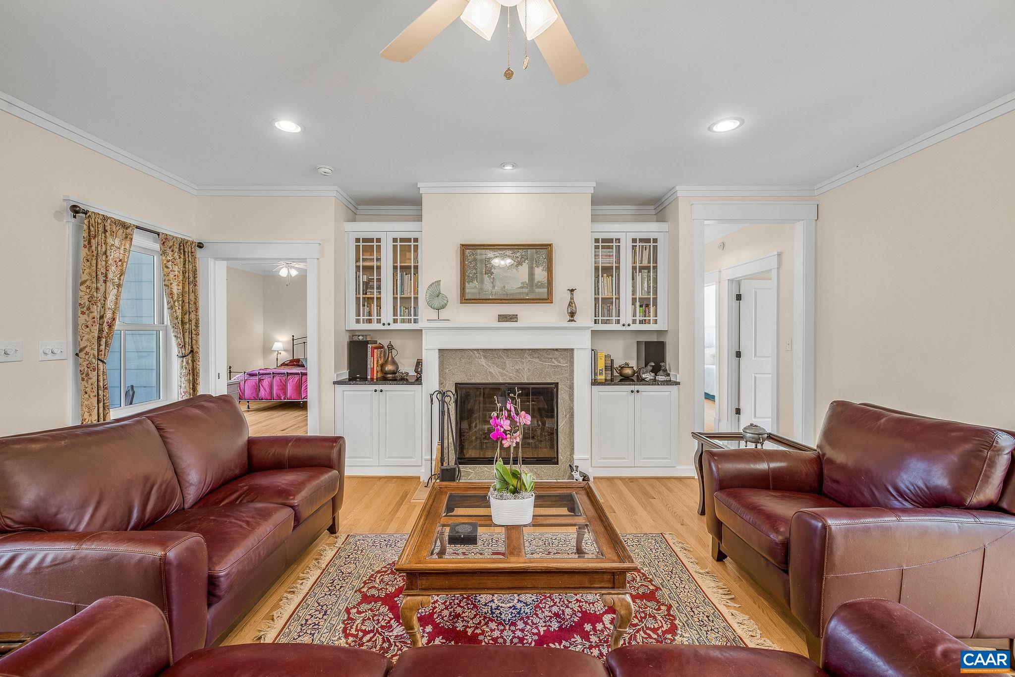 4764 Advance Mills Road Earlysville, VA 22936 - Photo 43 of 72 a living room with furniture and a fireplace