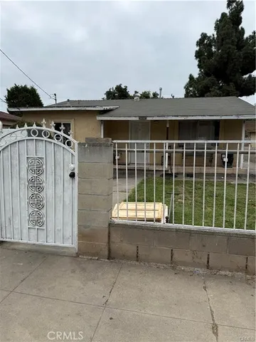a view of a balcony with an outdoor seating
