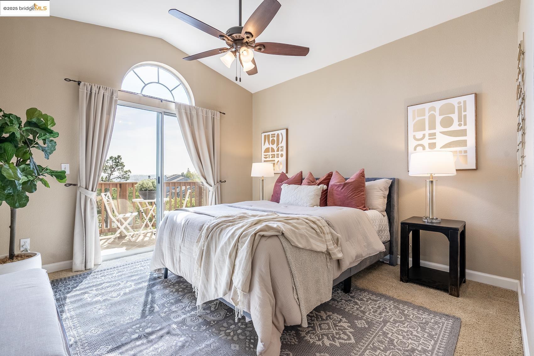 1105 Radiant Lane San Ramon, CA 94583 - Photo 1 of 1 a bedroom with a large bed and a chandelier