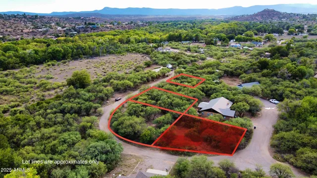 an aerial view of residential house and outdoor space