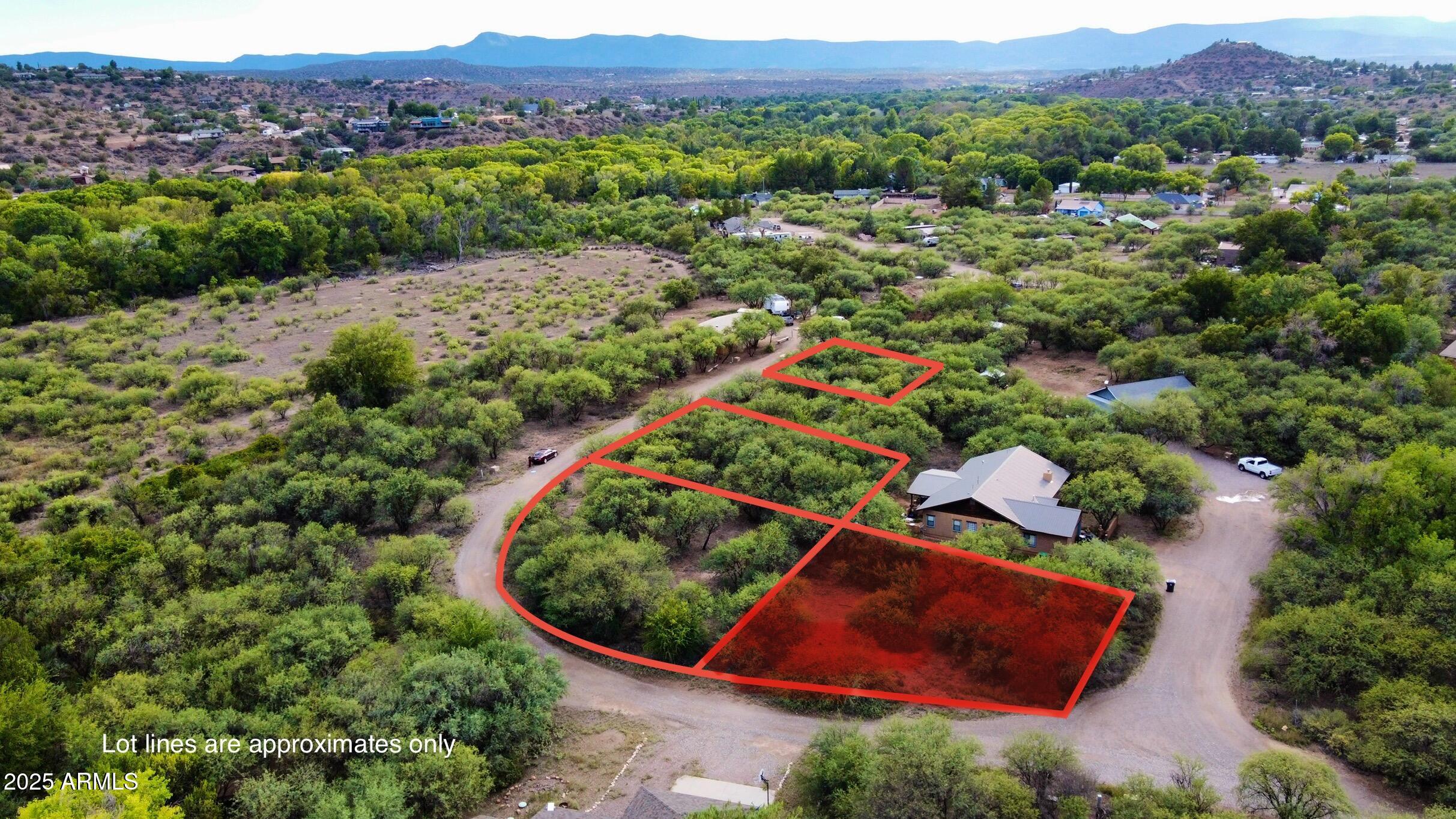an aerial view of residential house and outdoor space