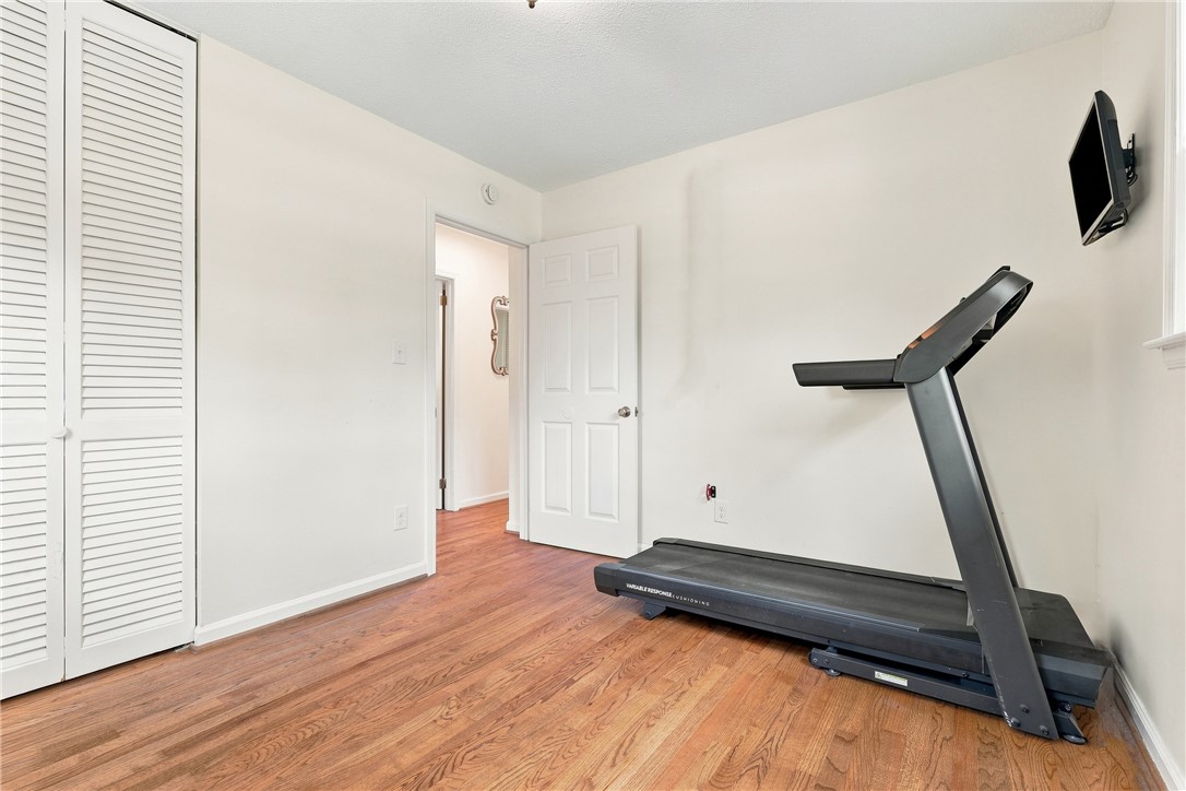204 Sylvia Road Easley, SC 29642 - Photo 24 of 36 Hardwood floors and bright white walls create an airy, versatile space.