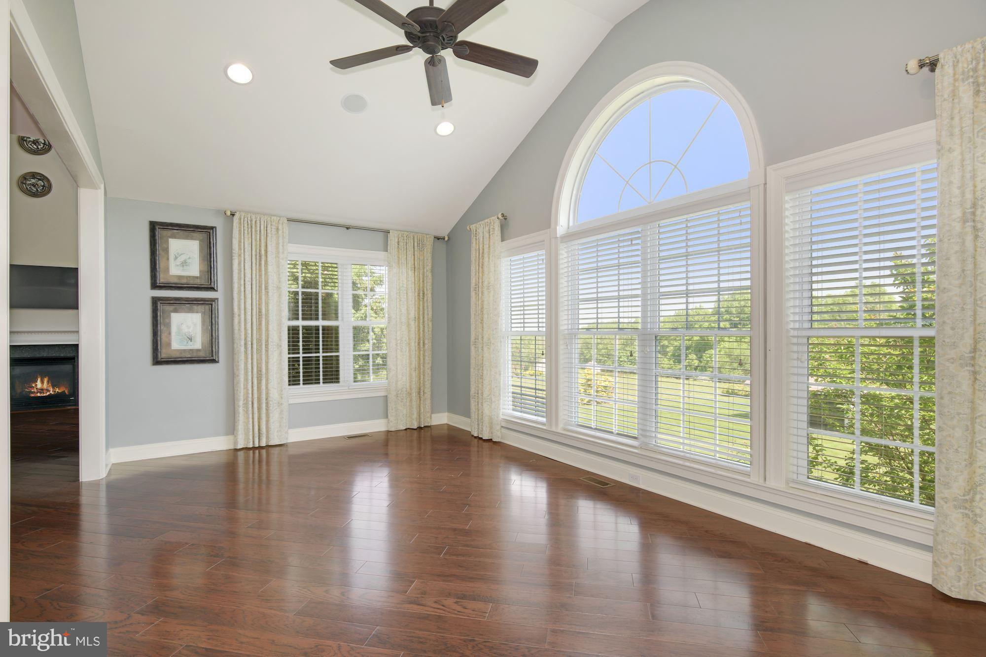 115 Telegraph Road Perkasie, PA 18944 - Photo 10 of 46 a view of an empty room with a window and wooden floor