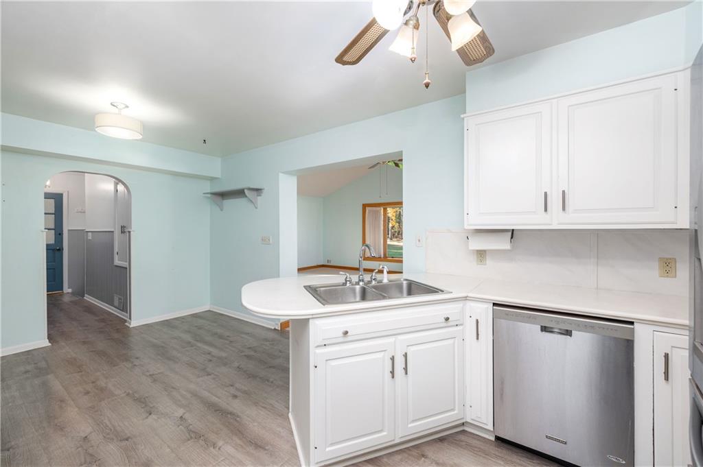 686 Christy Road Hermitage, PA 16148 - Photo 13 of 36 a kitchen with cabinets appliances and a sink