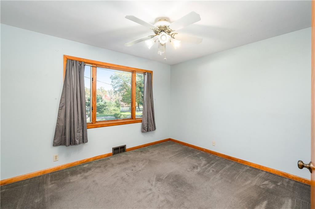 686 Christy Road Hermitage, PA 16148 - Photo 26 of 36 an empty room with windows and fan