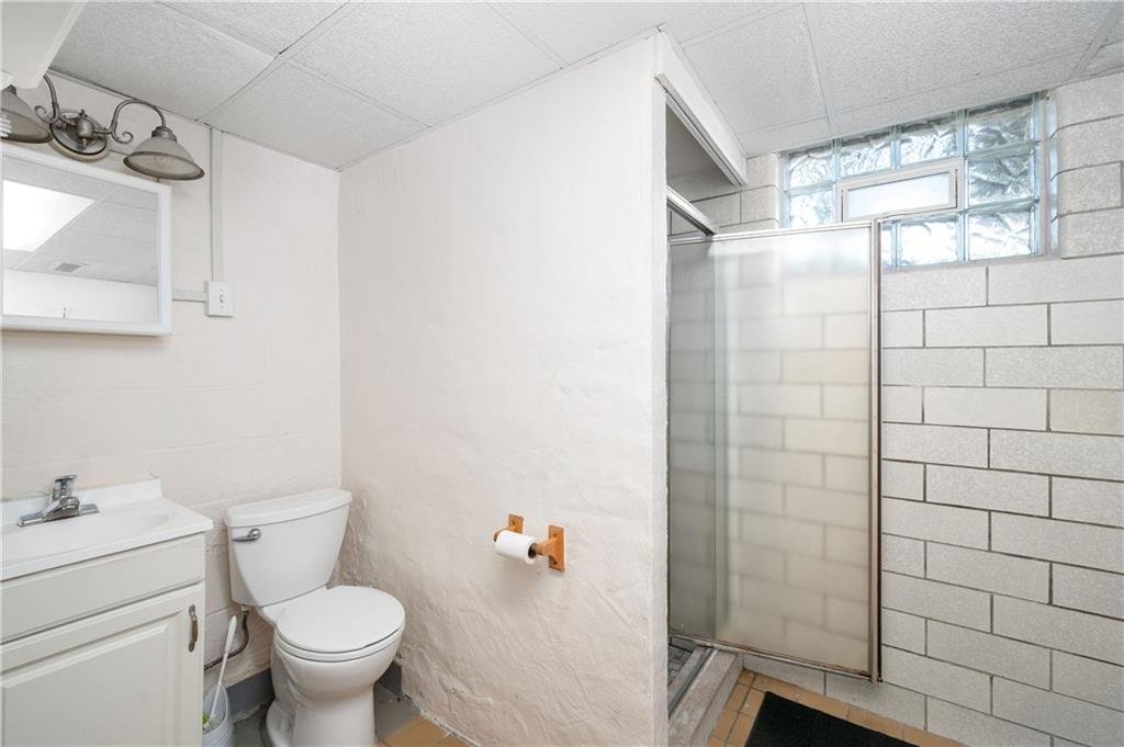 686 Christy Road Hermitage, PA 16148 - Photo 29 of 36 a bathroom with a sink toilet and shower