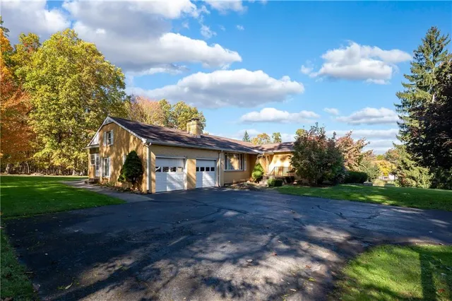 a view of house with outdoor space