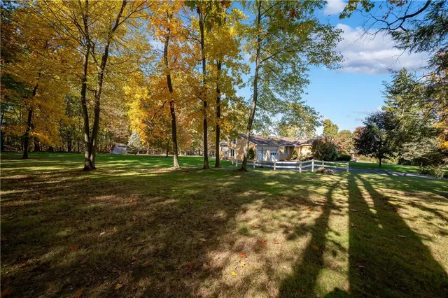 a view of a playground with basketball court