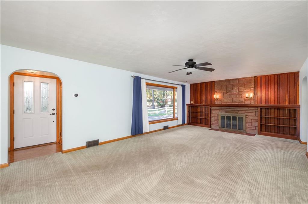 686 Christy Road Hermitage, PA 16148 - Photo 5 of 36 an empty room with windows and ceiling fan