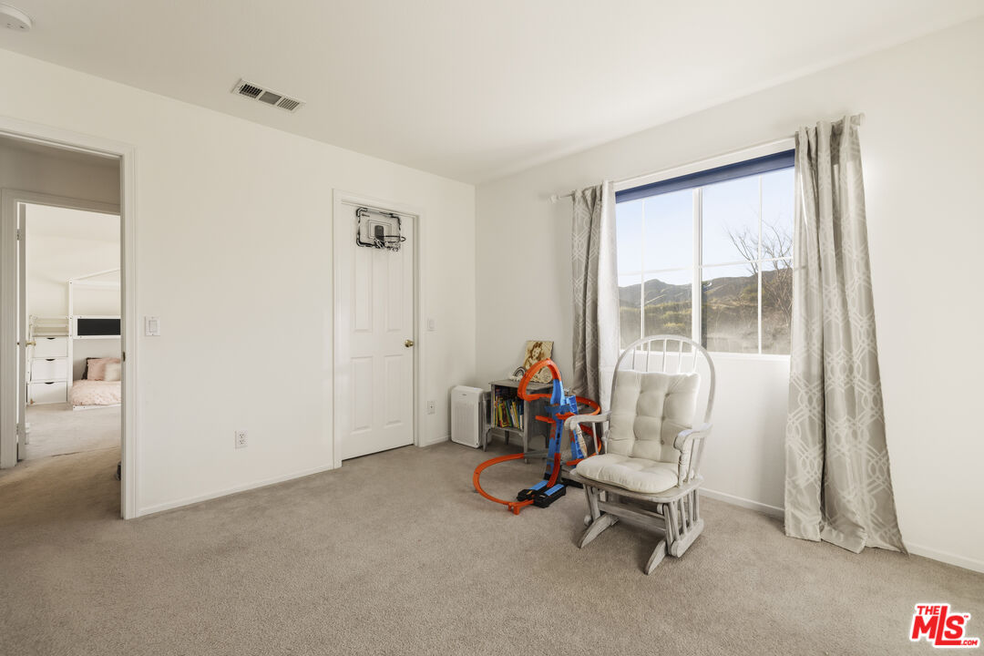 32610 Ridge Top Lane Castaic, CA 91384 - Photo 28 of 49 a view of a room with gym equipment