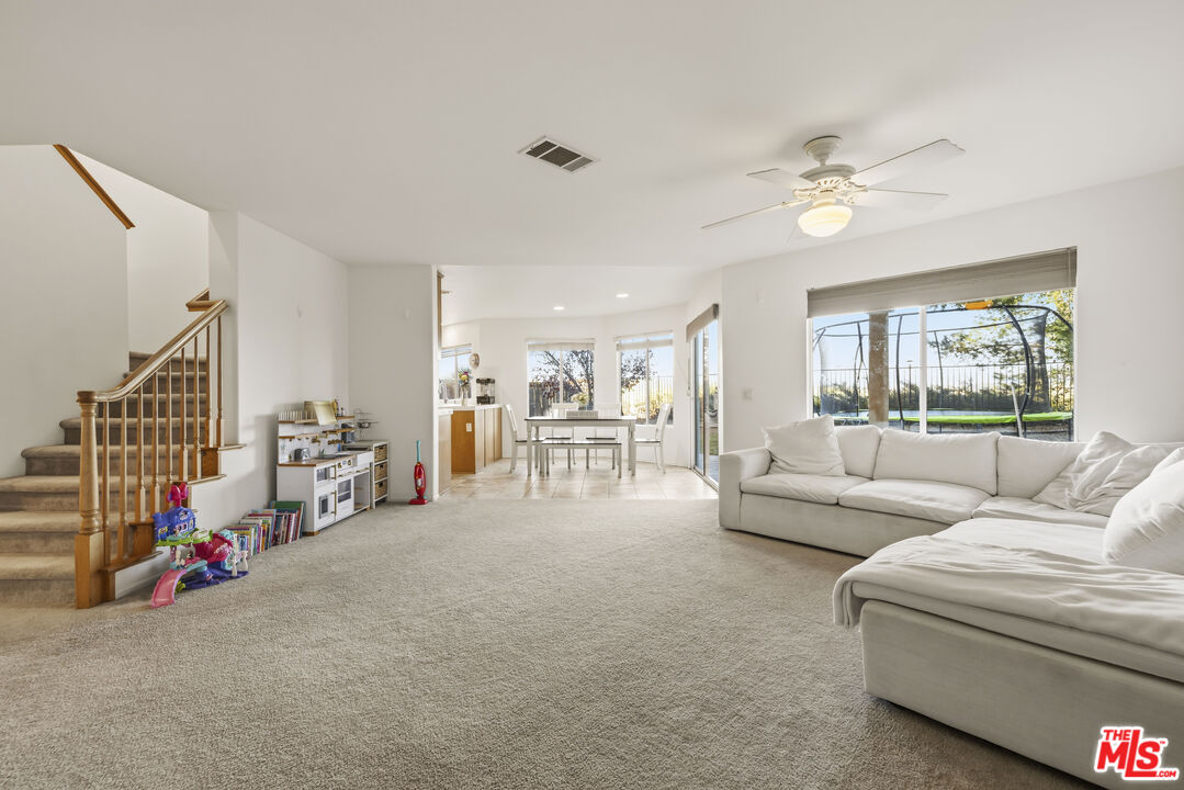 32610 Ridge Top Lane Castaic, CA 91384 - Photo 6 of 49 a living room with furniture and a large window