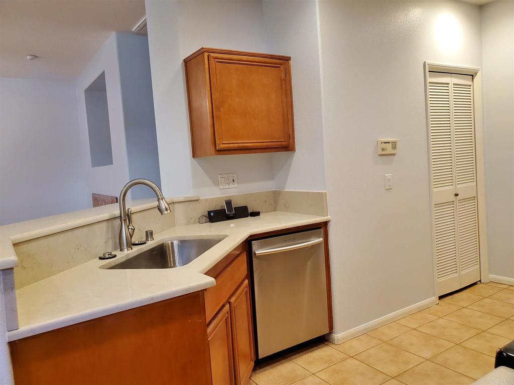 6116 Citracado Circle Carlsbad, CA 92009 - Photo 11 of 32 a close view of sink and tap