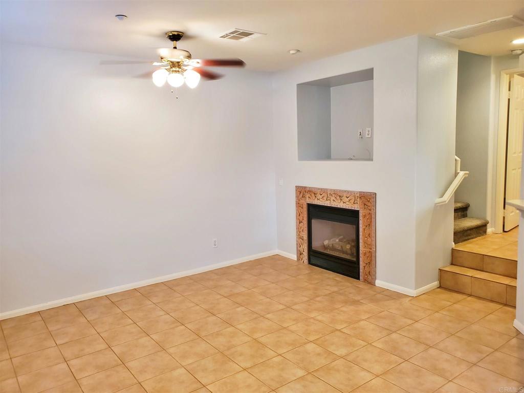 6116 Citracado Circle Carlsbad, CA 92009 - Photo 14 of 32 a view of an empty room with a fireplace