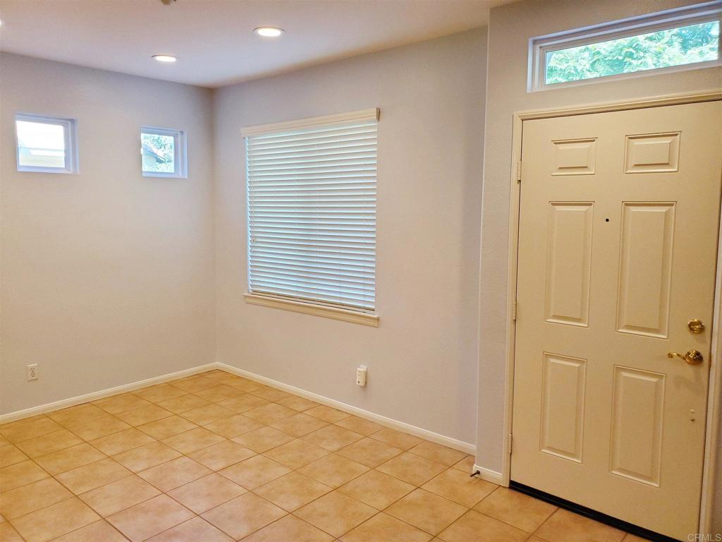 6116 Citracado Circle Carlsbad, CA 92009 - Photo 15 of 32 an empty room with windows
