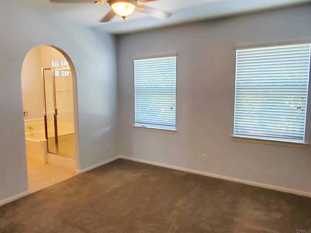6116 Citracado Circle Carlsbad, CA 92009 - Photo 17 of 32 an empty room with windows