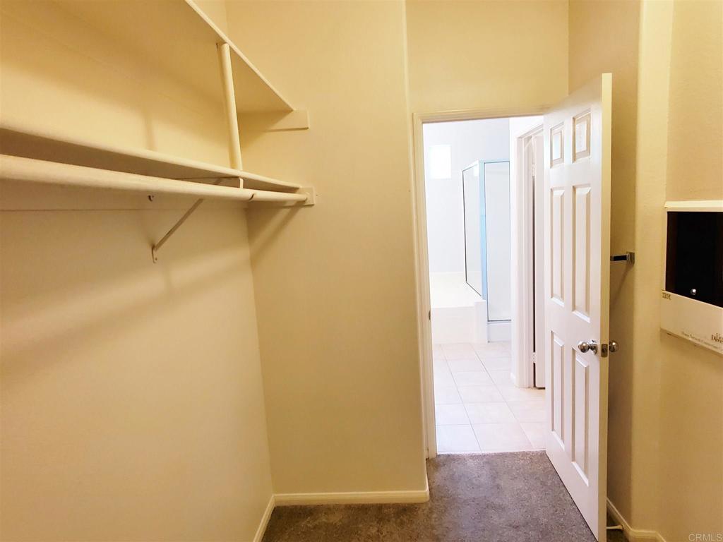 6116 Citracado Circle Carlsbad, CA 92009 - Photo 23 of 32 a view of a room with wooden floor