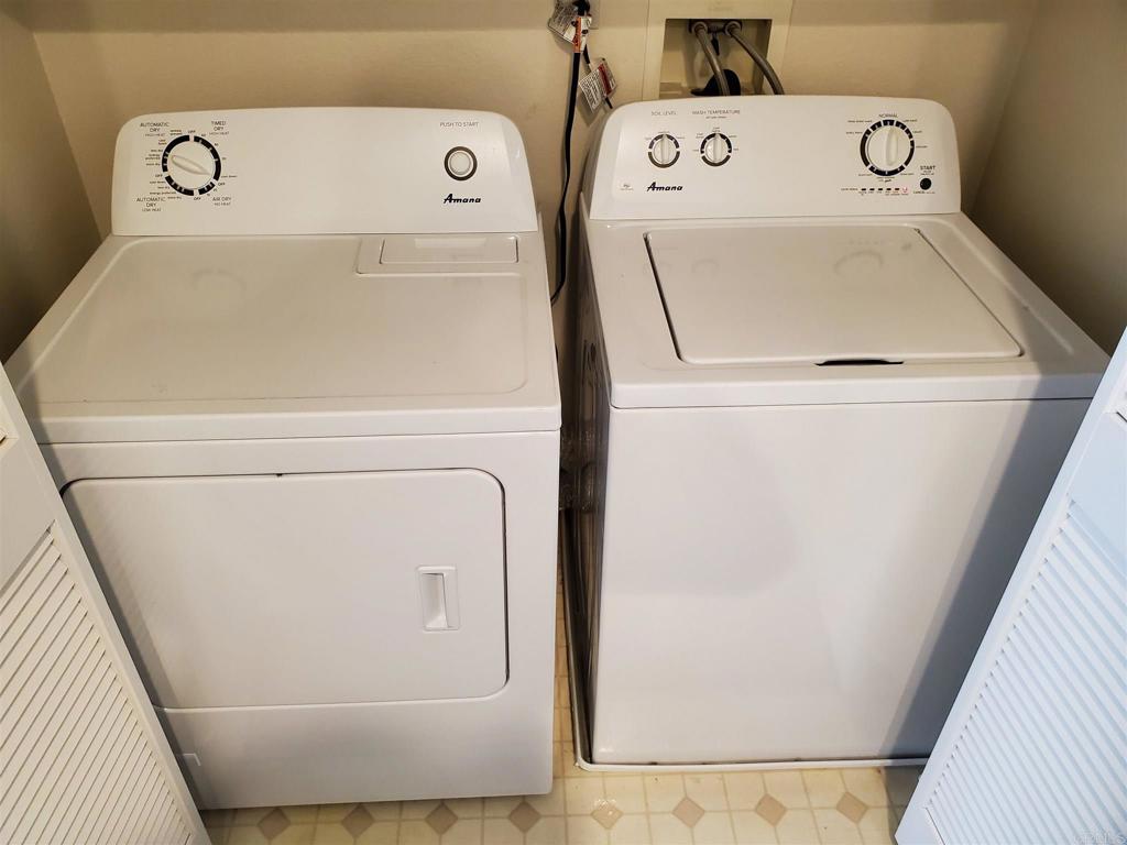 6116 Citracado Circle Carlsbad, CA 92009 - Photo 24 of 32 a utility room with dryer and washer