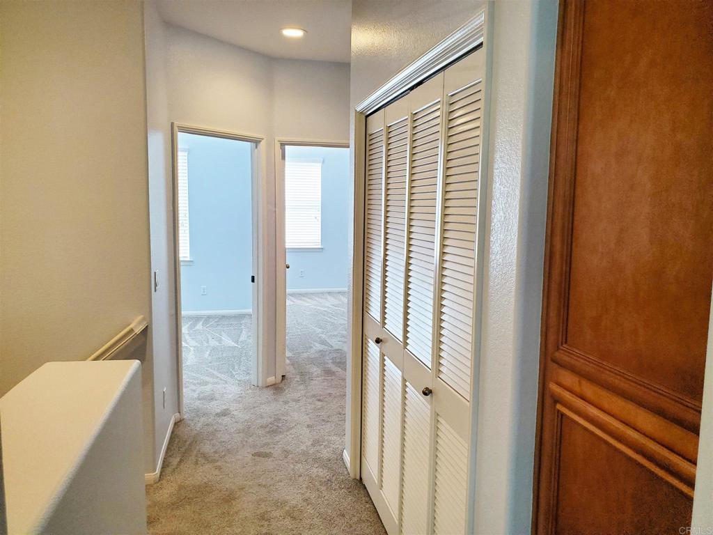 6116 Citracado Circle Carlsbad, CA 92009 - Photo 25 of 32 a view of a bathroom with a tub and shower