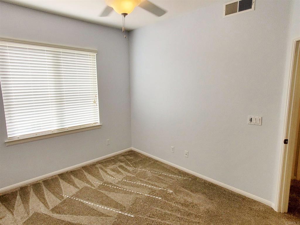 6116 Citracado Circle Carlsbad, CA 92009 - Photo 26 of 32 a view of a room with a window