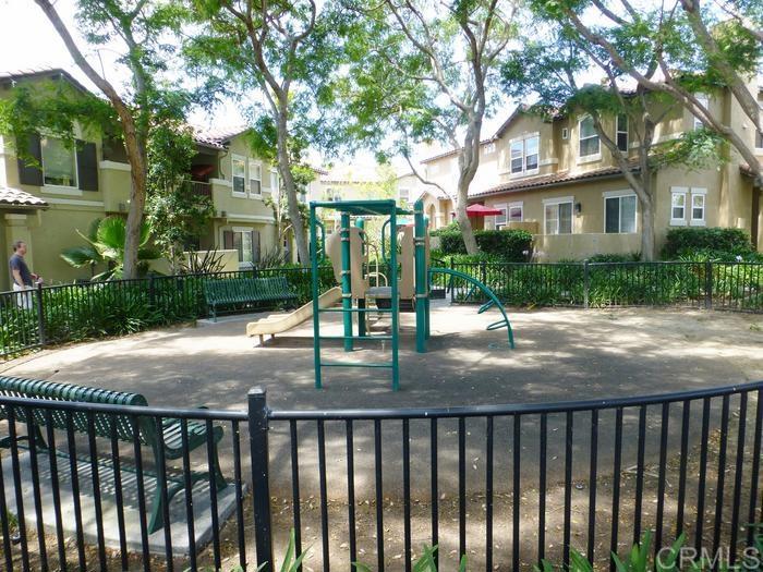 6116 Citracado Circle Carlsbad, CA 92009 - Photo 3 of 32 a view of street with small yard