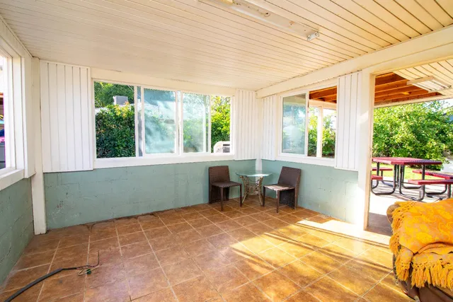 a room with furniture and a window