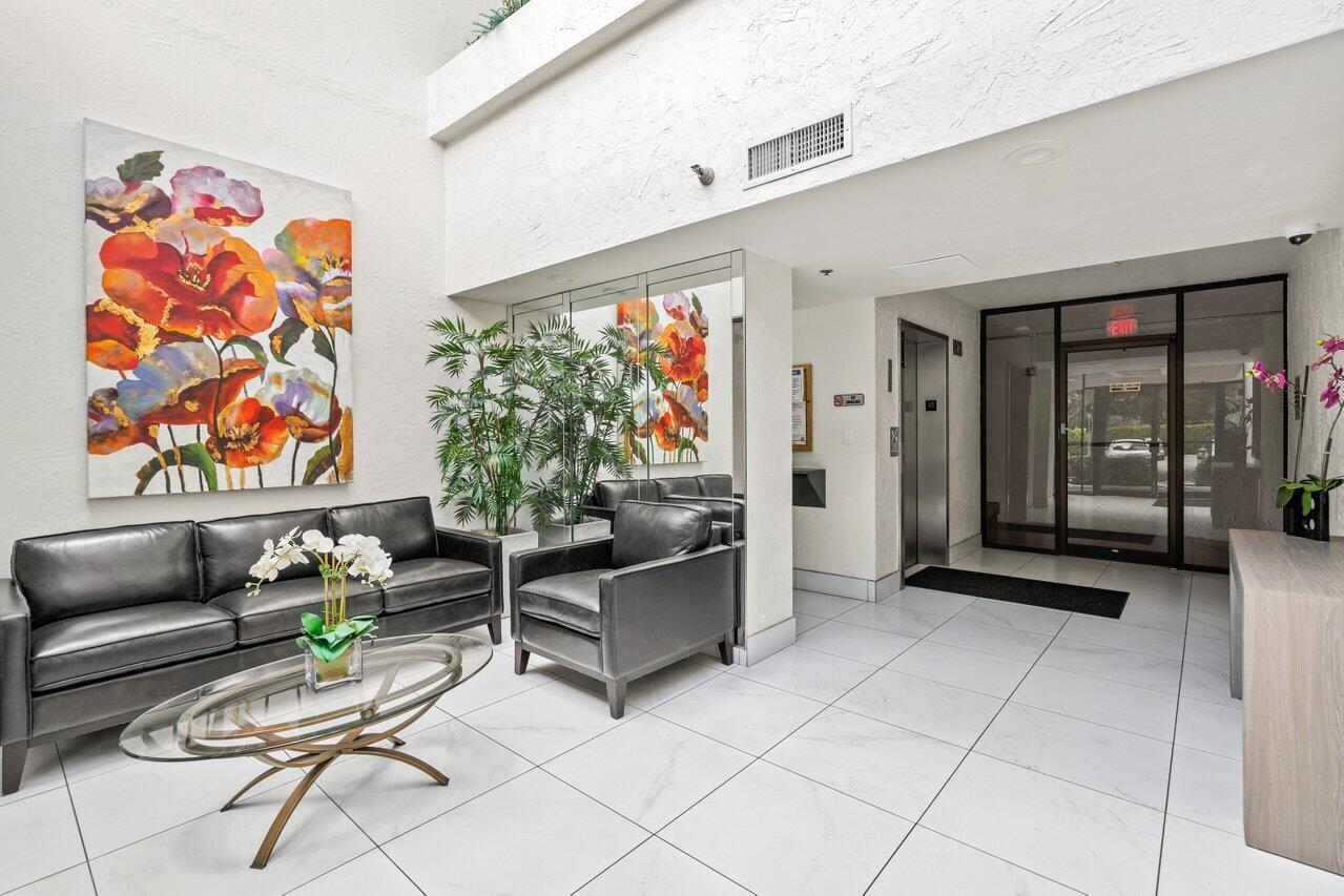 6320 Boca Del Mar Drive, Unit 302 Boca Raton, FL 33433 - Photo 24 of 35 a outdoor living space with furniture and a potted plant